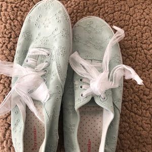 Light teal tennis shoes